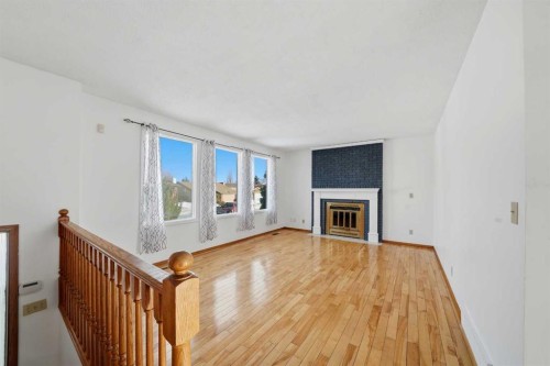 32 Huget Crescent, Red Deer, AB - Indoor With Fireplace