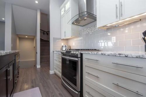 68 Thompson Crescent, Red Deer, AB - Indoor Photo Showing Kitchen With Upgraded Kitchen