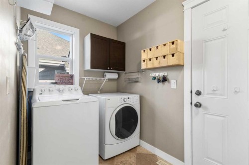 7008 Henners Gate, Lacombe, AB - Indoor Photo Showing Laundry Room