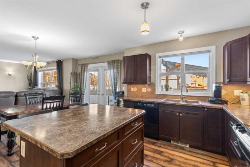 7008 Henners Gate, Lacombe, AB - Indoor Photo Showing Kitchen With Double Sink