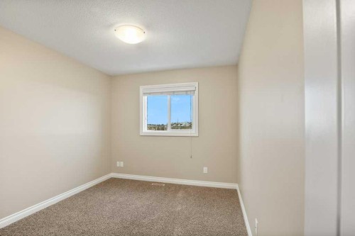 25 Ross Close, Sylvan Lake, AB - Indoor Photo Showing Other Room