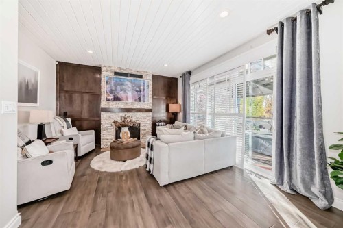 92 Allwright Close, Red Deer, AB - Indoor Photo Showing Living Room With Fireplace