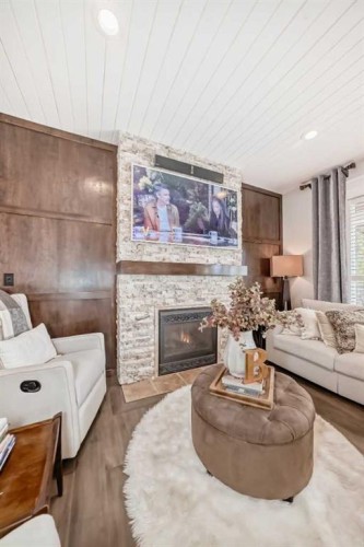 92 Allwright Close, Red Deer, AB - Indoor Photo Showing Living Room With Fireplace