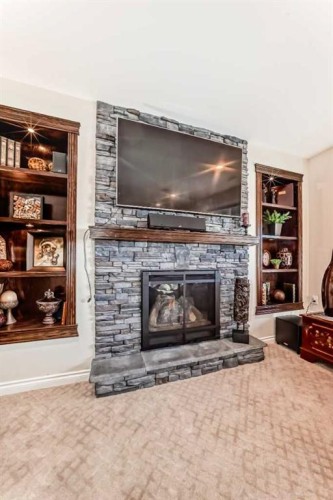 92 Allwright Close, Red Deer, AB - Indoor Photo Showing Living Room With Fireplace