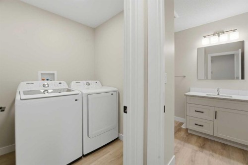 82 Bruns Crescent, Lacombe, AB - Indoor Photo Showing Laundry Room