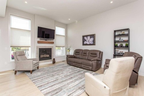 12 Emmett Crescent, Red Deer, AB - Indoor Photo Showing Living Room With Fireplace