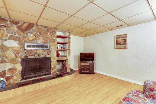 40 Nielsen Close, Red Deer, AB - Indoor With Fireplace