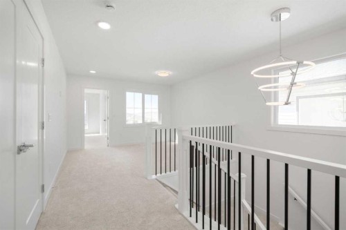 87 Heritage Manor, Cochrane, AB - Indoor Photo Showing Other Room