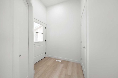 87 Heritage Manor, Cochrane, AB - Indoor Photo Showing Other Room