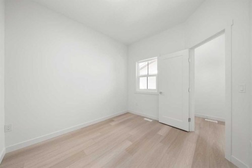 87 Heritage Manor, Cochrane, AB - Indoor Photo Showing Other Room
