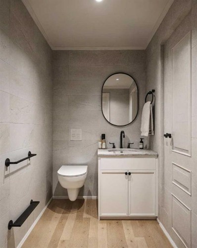 87 Heritage Manor, Cochrane, AB - Indoor Photo Showing Bathroom