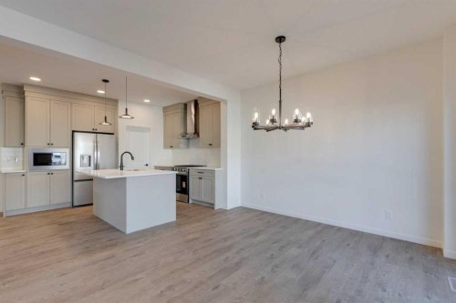 1379 Bayview Crescent Sw, Airdrie, AB - Indoor Photo Showing Kitchen With Upgraded Kitchen