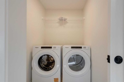 1379 Bayview Crescent Sw, Airdrie, AB - Indoor Photo Showing Laundry Room