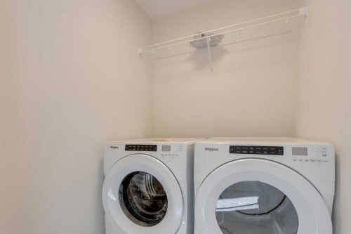 1379 Bayview Crescent Sw, Airdrie, AB - Indoor Photo Showing Laundry Room
