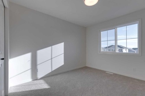1379 Bayview Crescent Sw, Airdrie, AB - Indoor Photo Showing Other Room