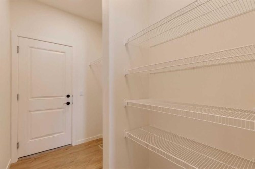 1379 Bayview Crescent Sw, Airdrie, AB - Indoor With Storage