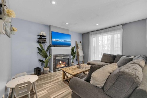 157 Kidd Close, Red Deer, AB - Indoor Photo Showing Living Room With Fireplace