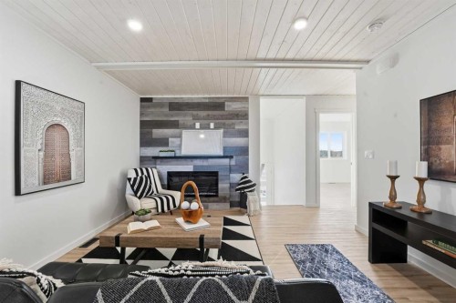 6 Metcalf Way, Lacombe, AB - Indoor With Fireplace