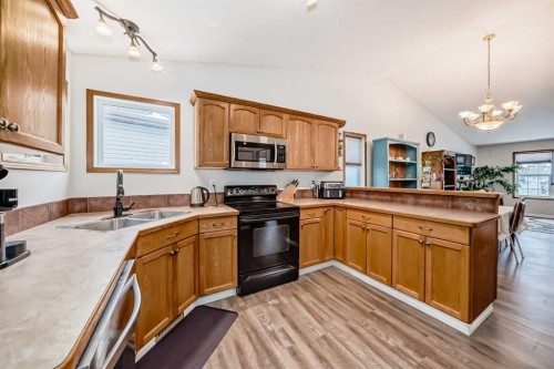 13 Rolling Hills Ridge, Blackfalds, AB - Indoor Photo Showing Kitchen With Double Sink