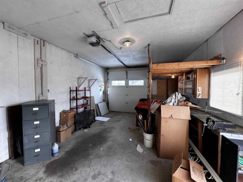 202 Ebert Close, Red Deer, AB - Indoor Photo Showing Garage