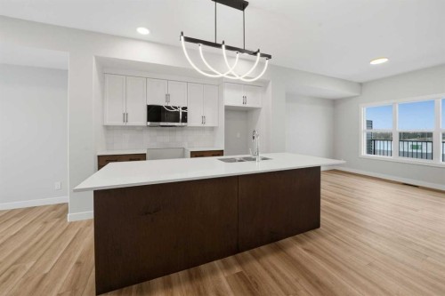17 Gray Close, Sylvan Lake, AB - Indoor Photo Showing Kitchen With Double Sink