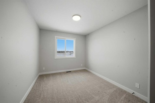 17 Gray Close, Sylvan Lake, AB - Indoor Photo Showing Other Room