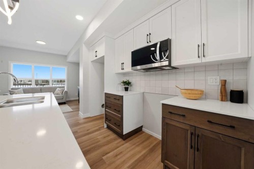 17 Gray Close, Sylvan Lake, AB - Indoor Photo Showing Kitchen With Double Sink