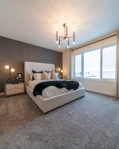 651 Chelsea Pier Run, Chestermere, AB - Indoor Photo Showing Bedroom