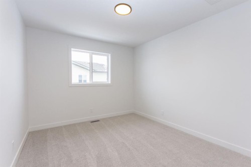 12 Trinity Street, Lacombe, AB - Indoor Photo Showing Other Room