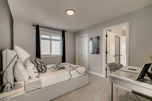 249 Dawson Wharf Crescent, Chestermere, AB - Indoor Photo Showing Bedroom