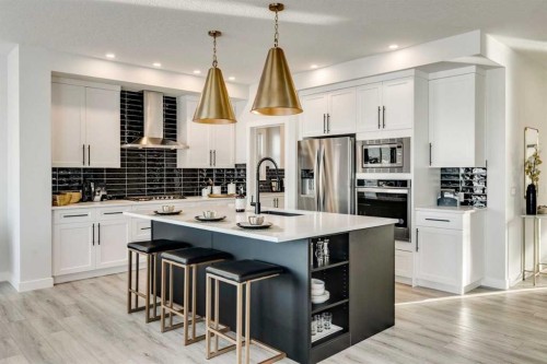 249 Dawson Wharf Crescent, Chestermere, AB - Indoor Photo Showing Kitchen With Stainless Steel Kitchen With Upgraded Kitchen