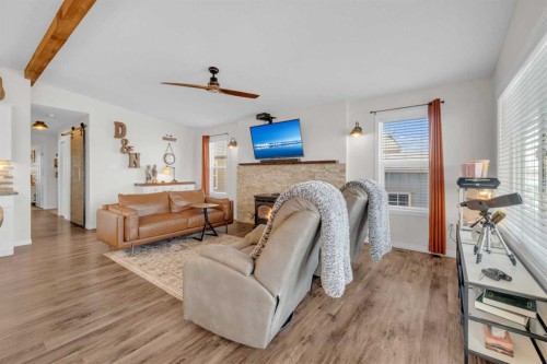 19-41019 Range Road 11, Rural Lacombe County, AB - Indoor Photo Showing Living Room With Fireplace