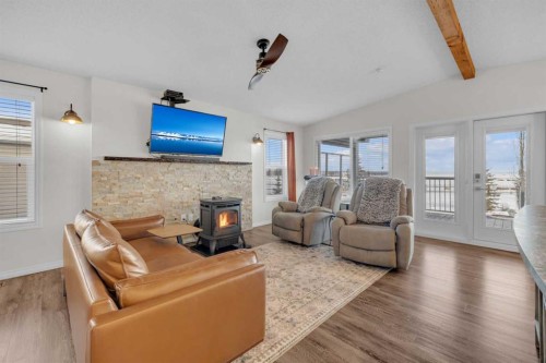 19-41019 Range Road 11, Rural Lacombe County, AB - Indoor Photo Showing Living Room With Fireplace