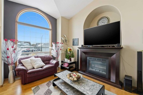 22 Lampard Crescent, Red Deer, AB - Indoor Photo Showing Living Room With Fireplace