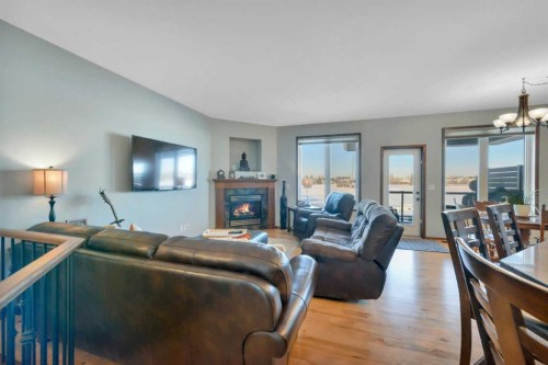 132 Illingworth Close, Red Deer, AB - Indoor Photo Showing Living Room With Fireplace
