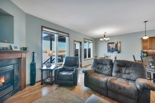 132 Illingworth Close, Red Deer, AB - Indoor Photo Showing Living Room With Fireplace