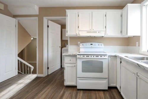 70 Mclevin Crescent, Red Deer, AB - Indoor Photo Showing Kitchen With Double Sink
