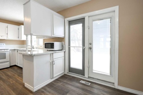 70 Mclevin Crescent, Red Deer, AB - Indoor Photo Showing Kitchen With Double Sink