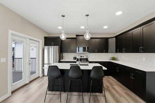 25 Murphy Close, Blackfalds, AB - Indoor Photo Showing Kitchen With Upgraded Kitchen