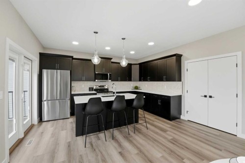 25 Murphy Close, Blackfalds, AB - Indoor Photo Showing Kitchen With Upgraded Kitchen