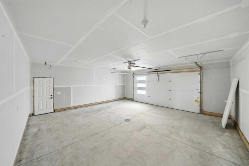 25 Murphy Close, Blackfalds, AB - Indoor Photo Showing Garage