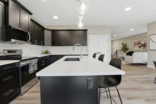 25 Murphy Close, Blackfalds, AB - Indoor Photo Showing Kitchen With Upgraded Kitchen