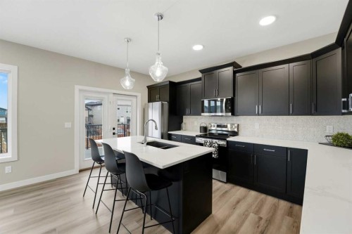 25 Murphy Close, Blackfalds, AB - Indoor Photo Showing Kitchen With Double Sink With Upgraded Kitchen