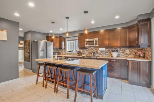13 Blackstone Avenue, Lacombe, AB - Indoor Photo Showing Kitchen With Stainless Steel Kitchen With Upgraded Kitchen