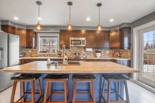 13 Blackstone Avenue, Lacombe, AB - Indoor Photo Showing Kitchen With Upgraded Kitchen