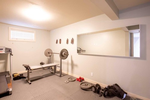 13 Blackstone Avenue, Lacombe, AB - Indoor Photo Showing Gym Room