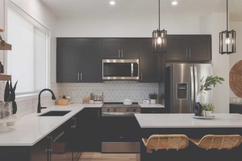 209-81 Midtown Boulevard Sw, Airdrie, AB - Indoor Photo Showing Kitchen With Upgraded Kitchen