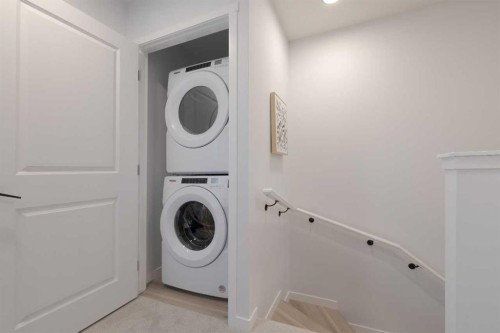 209-81 Midtown Boulevard Sw, Airdrie, AB - Indoor Photo Showing Laundry Room