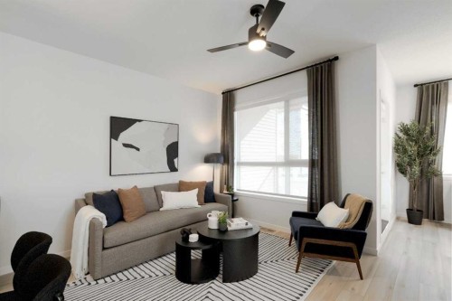 209-81 Midtown Boulevard Sw, Airdrie, AB - Indoor Photo Showing Living Room