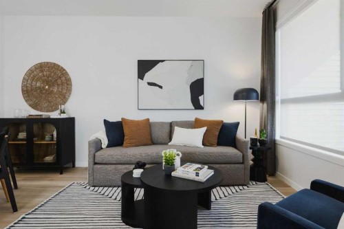 209-81 Midtown Boulevard Sw, Airdrie, AB - Indoor Photo Showing Living Room